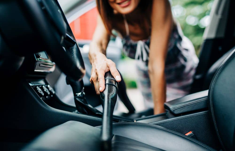 Cleaning car interior.