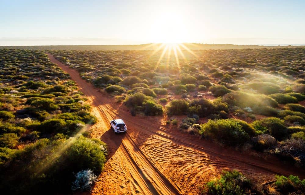 Driving sandy unpaved road.