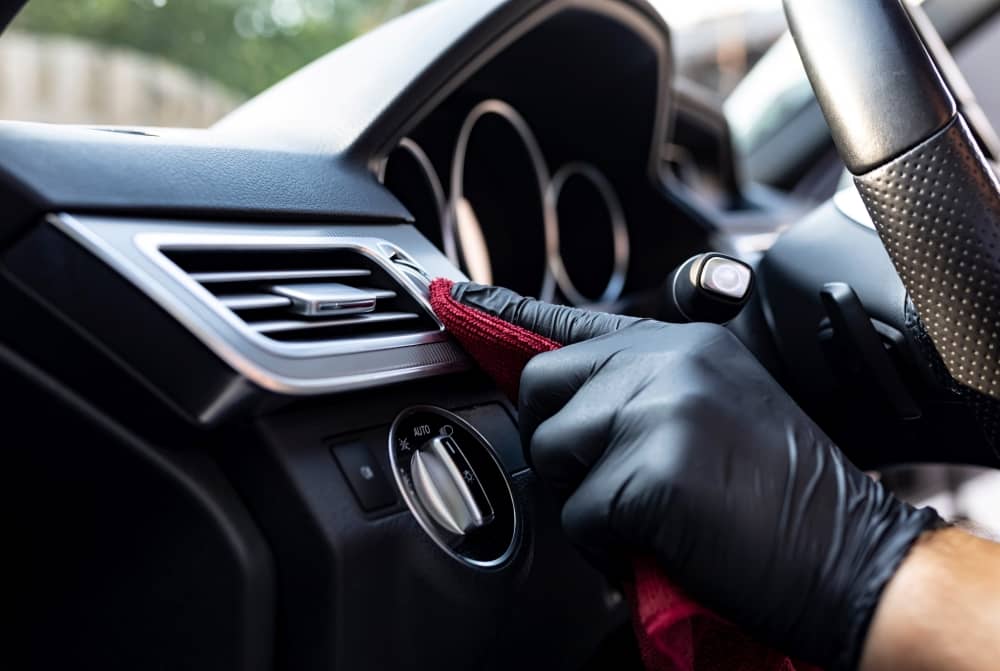 Wipe the dashboard with a clean microfiber towel after applying the dash polish.