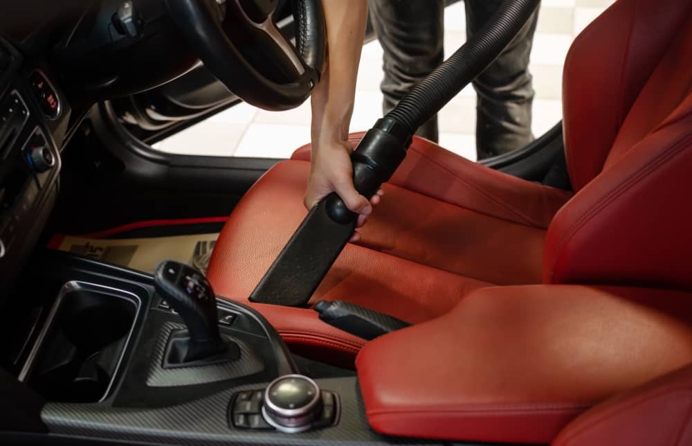 Start by thoroughly cleaning your car's interior. Remove any clutter, trash, or unnecessary items.